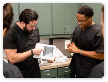 Instructor with Students in lab